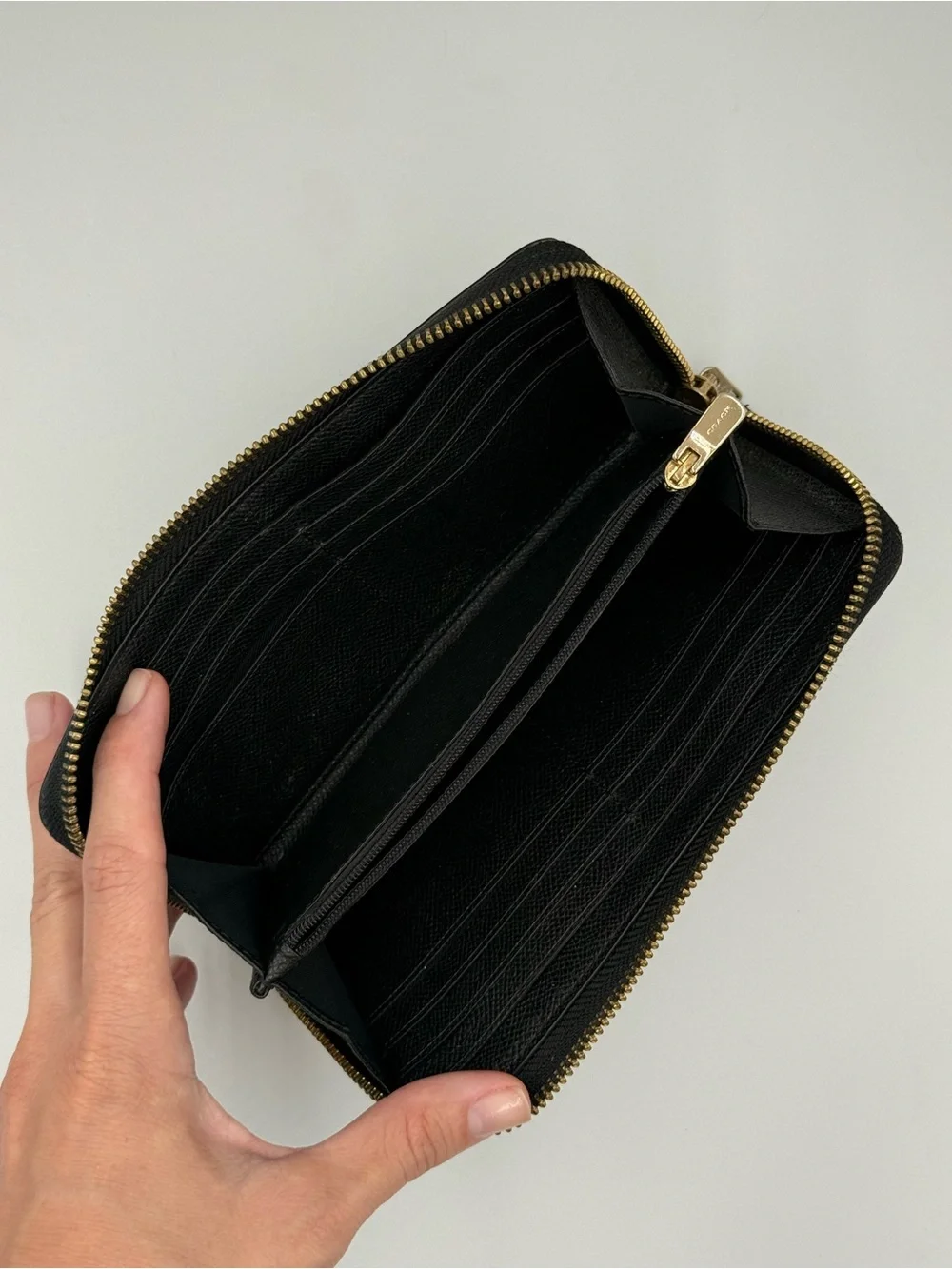 Coach Black Zip-Around Saffiano Leather Wallet with Gold Logo